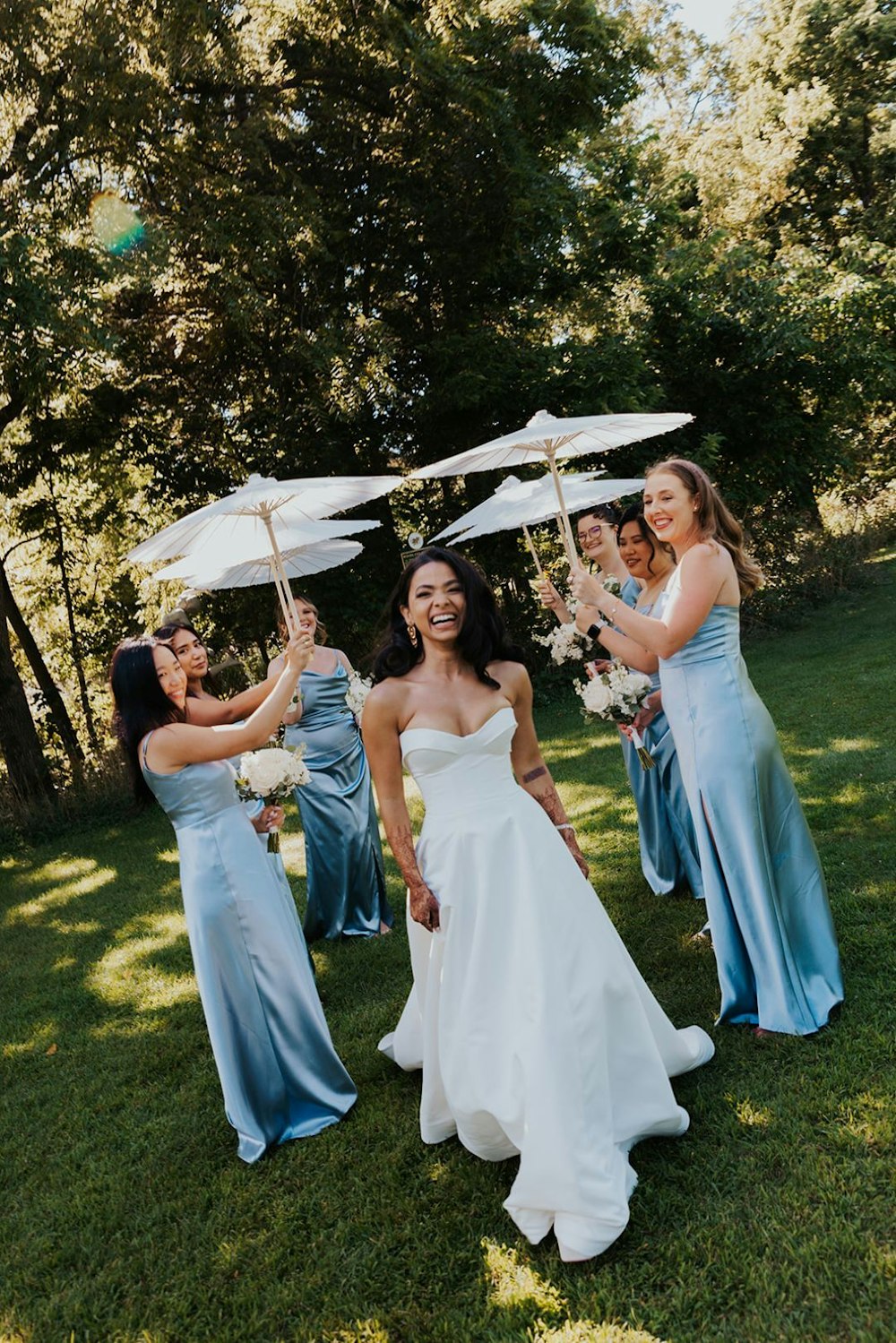 03 Bridesmaids Blue Paper Umbrellas jpgat The Grove Redfield Estate RW