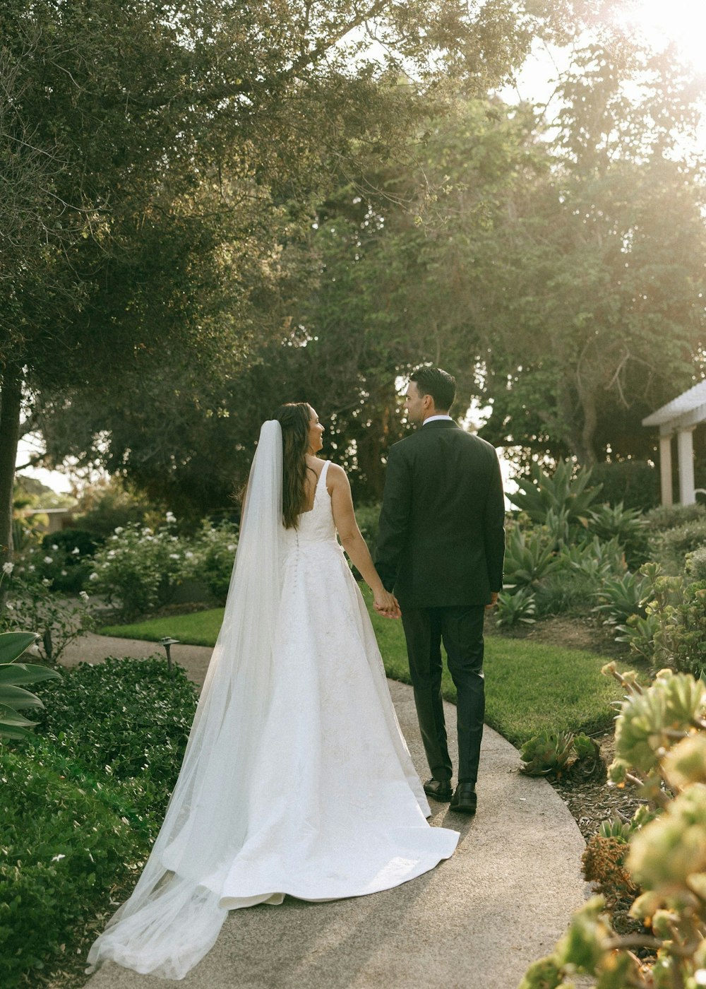 04 Couple Walking Romantic Garden at L Auberge Del Mar RW